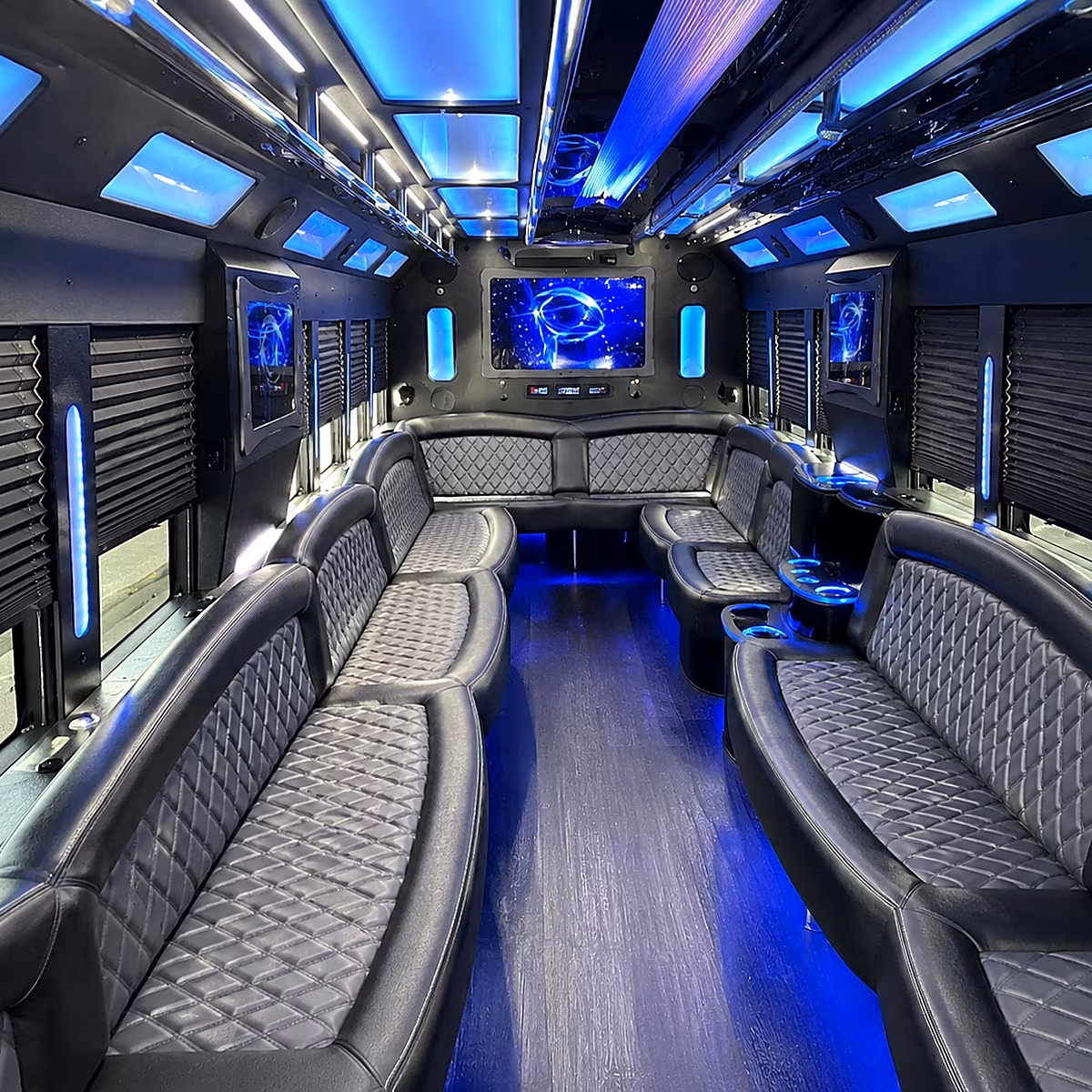 Friends laughing during a party bus celebration in Tulsa